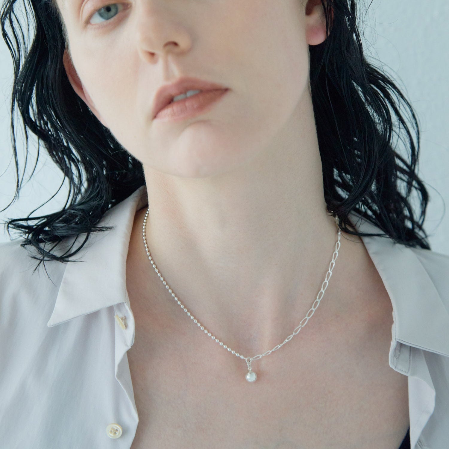 Asymmetrical ball necklace