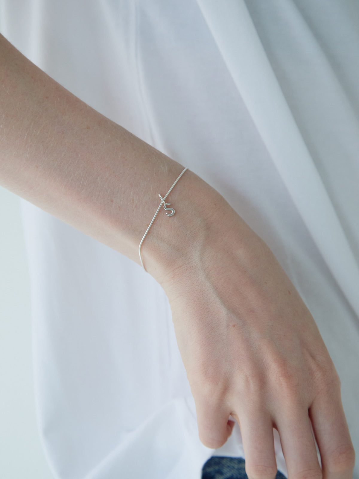 INITIAL CHARM