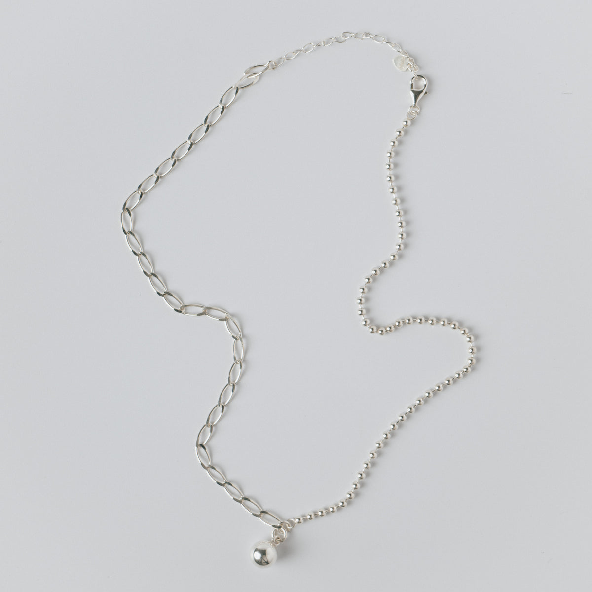 Asymmetrical ball necklace