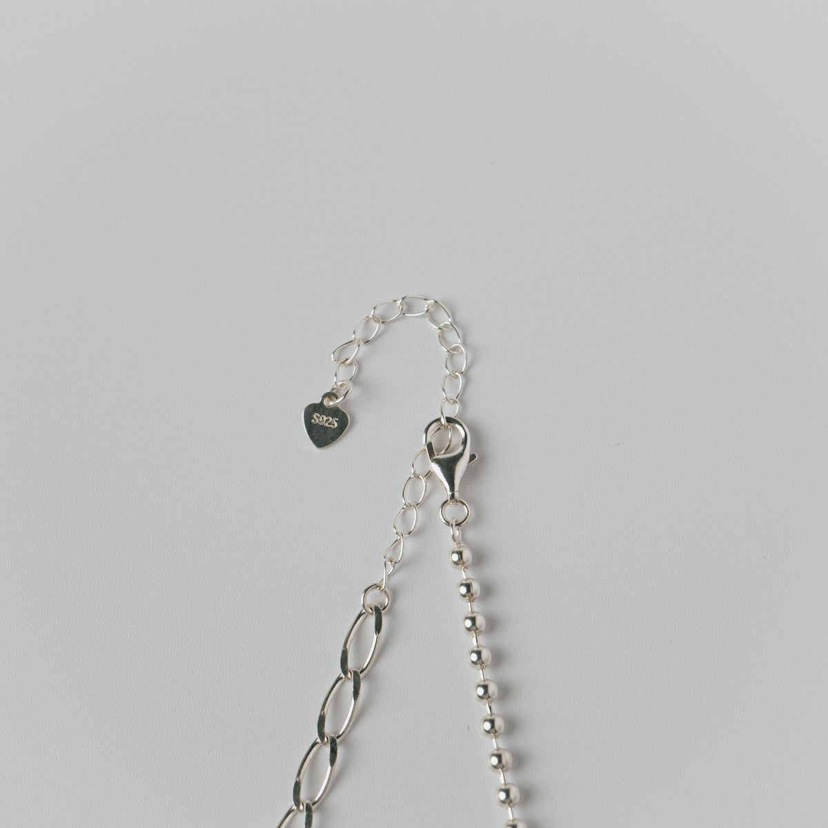 Asymmetrical ball necklace