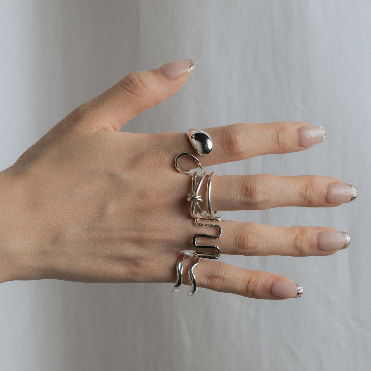 THREE LINE FREE RING