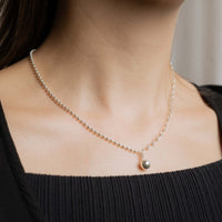 Asymmetrical ball necklace