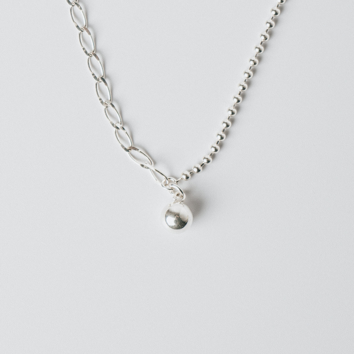 Asymmetrical ball necklace