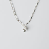 Asymmetrical ball necklace