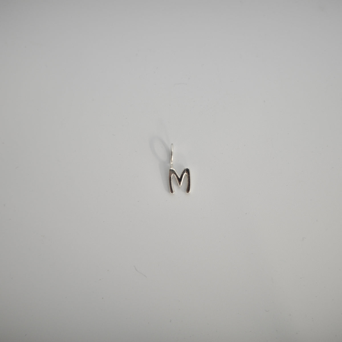 INITIAL CHARM