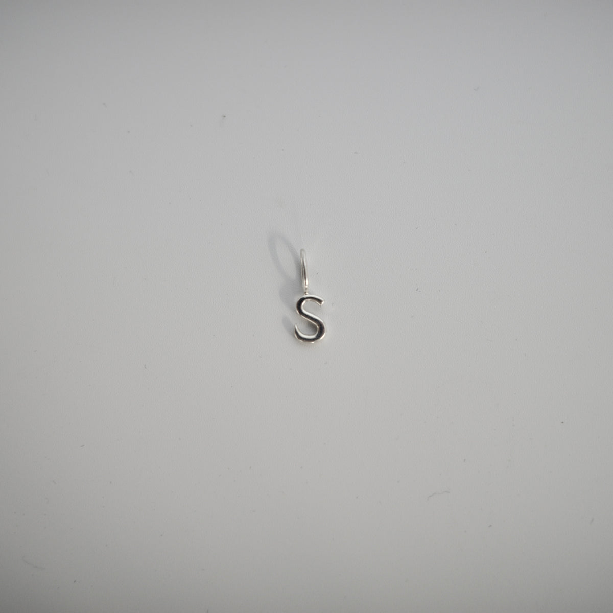 INITIAL CHARM