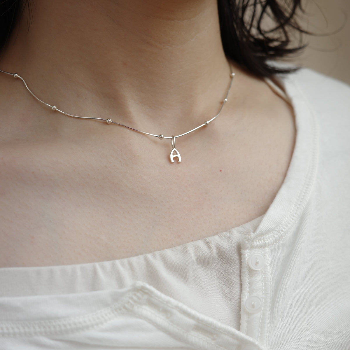 INITIAL CHARM